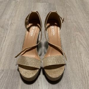 Gold platform heels